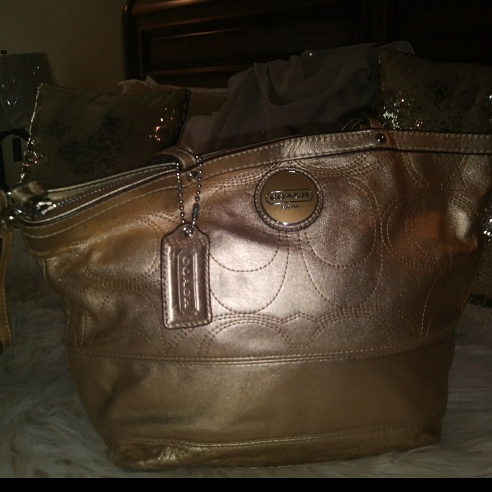 Gold coach purse